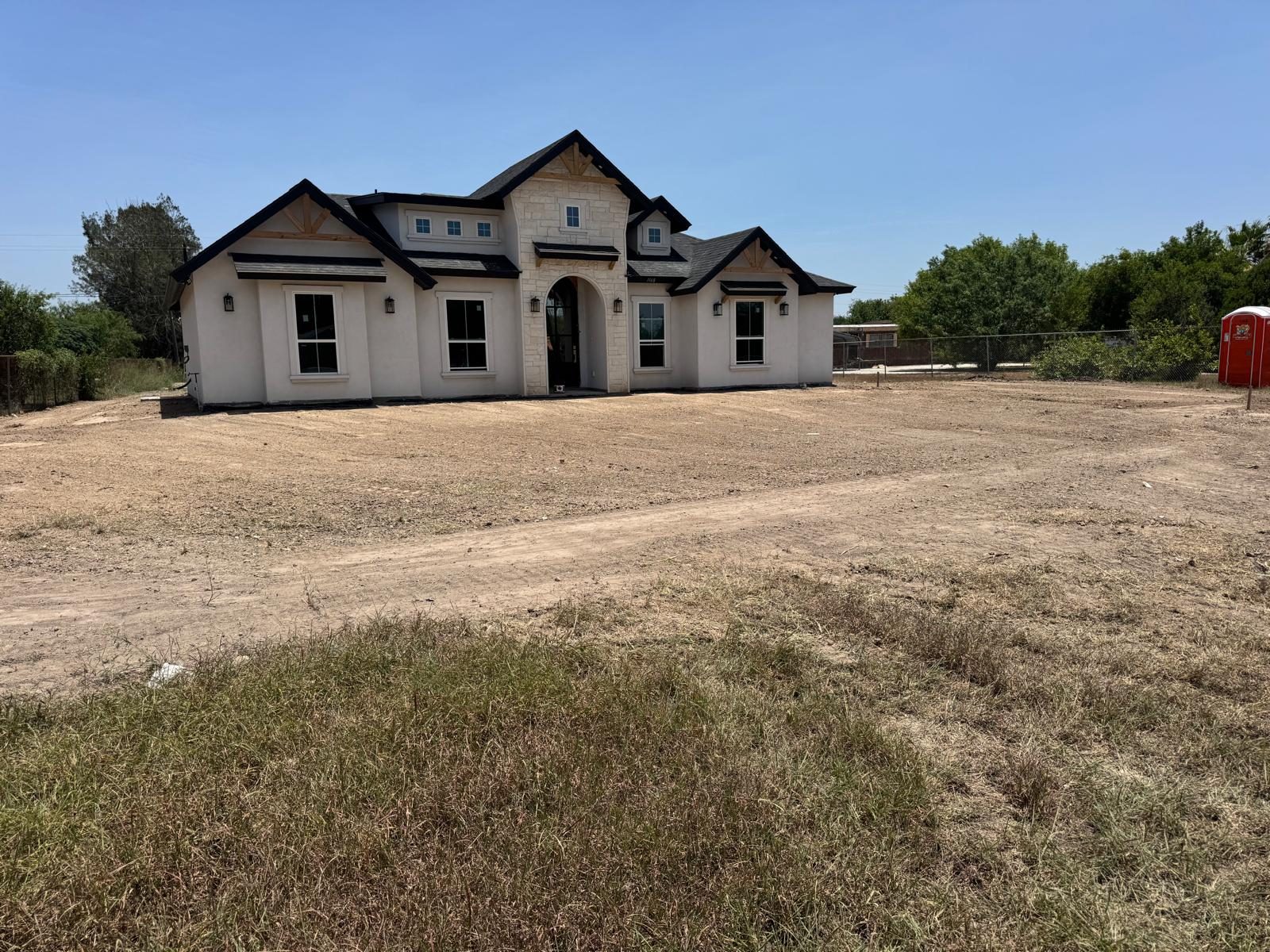 Graded lot in front of a new two-story home